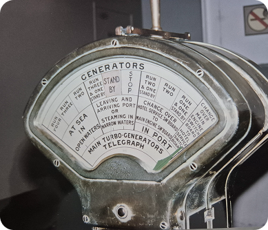 Hans Krijger and a man standing outdoors in a grassy area with a horse in the background